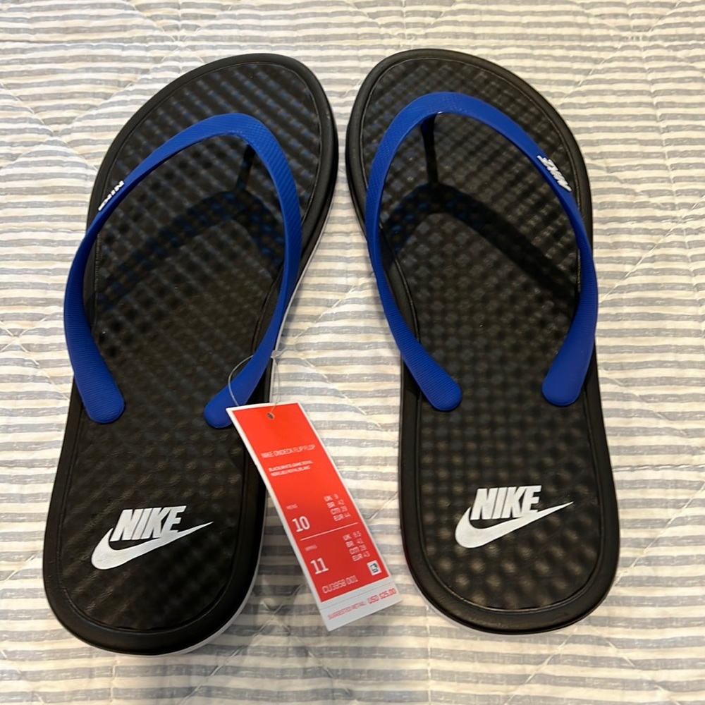 Nike Men’s flip flops. Brand new with tags and box. Size 10 mens.